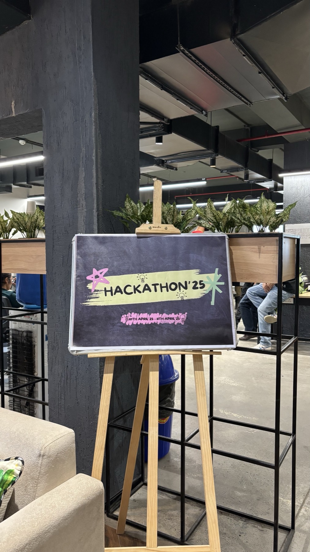 FarMart team at the hackathon finale in front of the Food Revolution sign